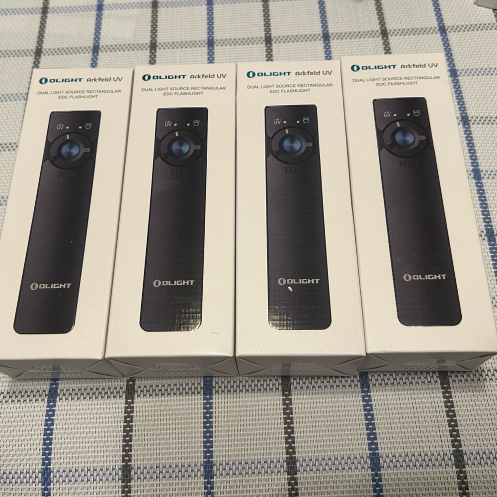 Olight arkfeld UV flashlight BNIb